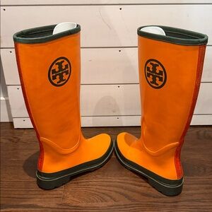 Authentic Tory Burch rain boots, orange with green logo. Size 6.